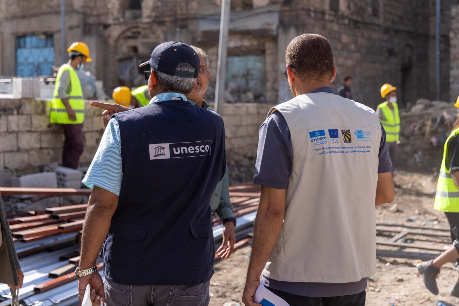 Field staff at a heritage-restoration site in Yemen — the Group's people living the founders' values