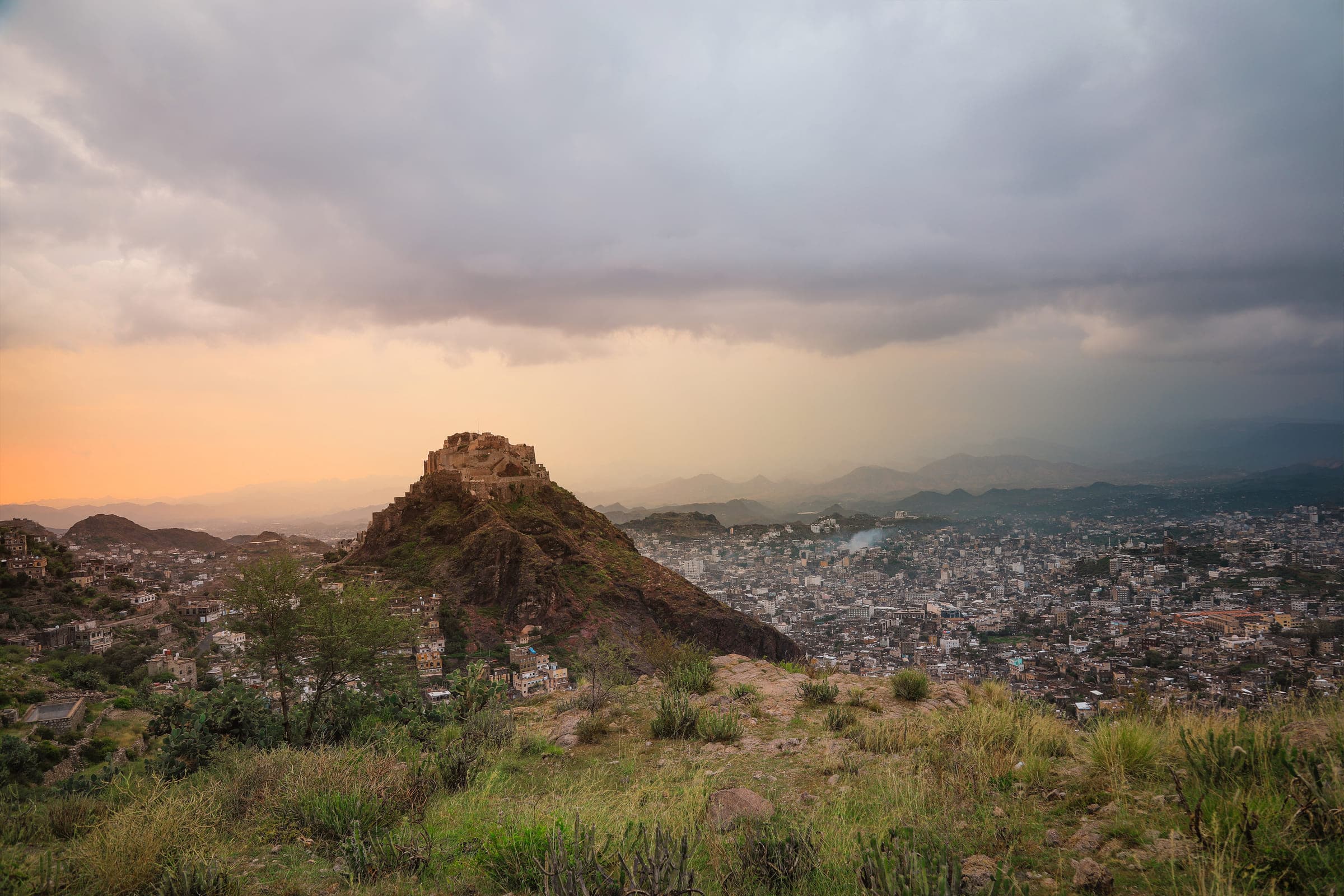 Cairo Castle above the city of Taiz at dusk — where the Group's story began